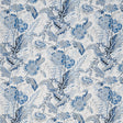 Sandoway Vine Delft blue floral wallpaper by Schumacher, inspired by 19th-century French Indienne prints, shown in a room setting and close-up details.