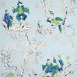 Chinoiserie Moderne blue wallpaper with whimsical figures, birds, and floral branches by Schumacher