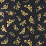 Burnell Butterfly wallpaper in black with metallic gold butterfly stamp design by Schumacher