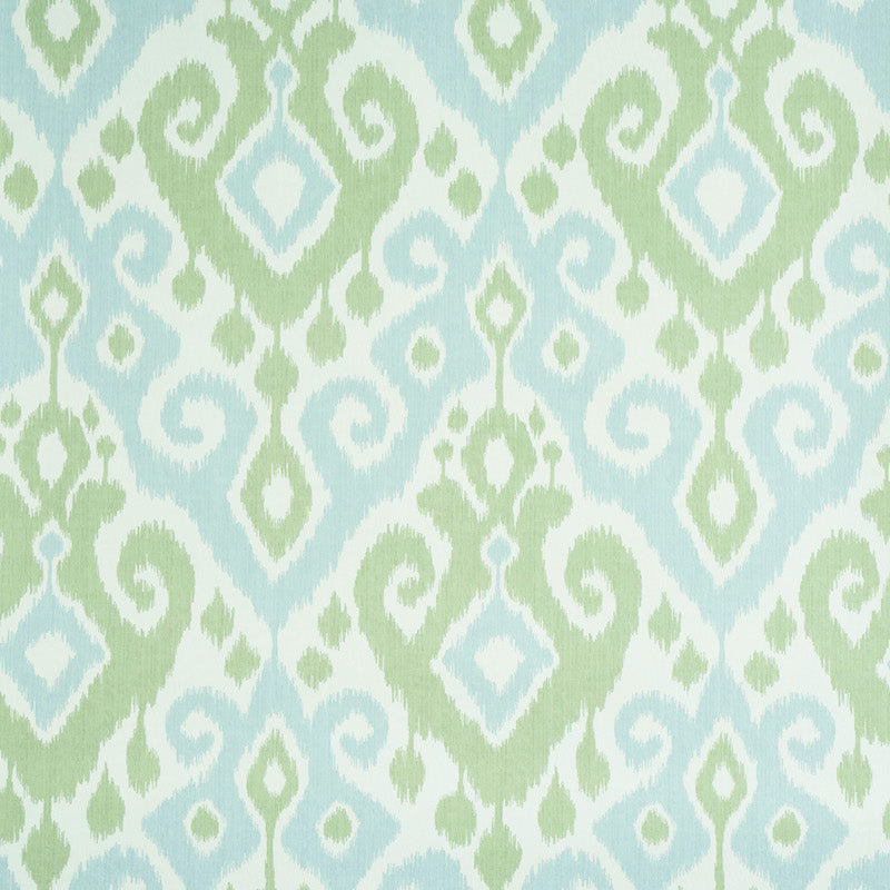 Dedra Damask wallpaper in Mineral & Leaf by Schumacher, featuring a subtle arabesque ikat pattern in green and blue tones.