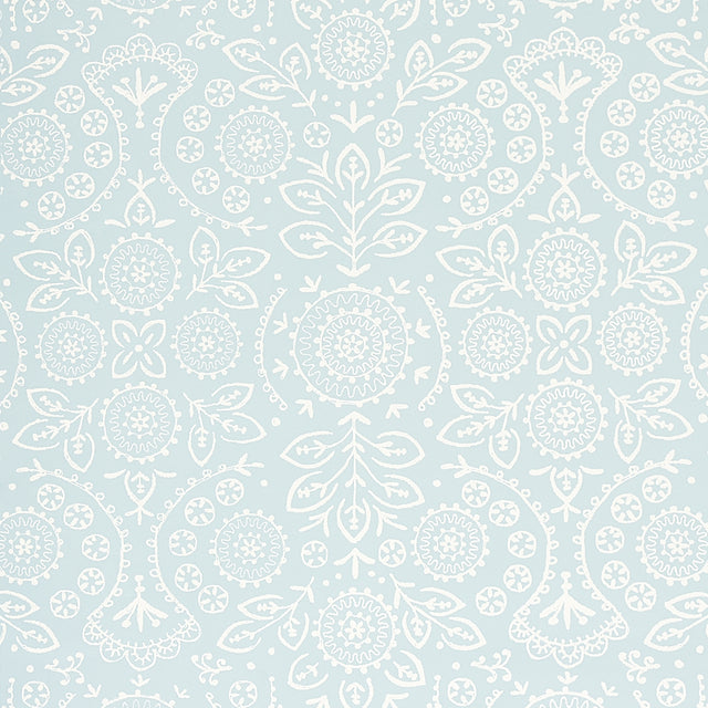TIANA Sky by Schumacher - Bohemia Collection, screen-printed wallcovering with large mirrored repeat in soft blue and white embroidery effect.