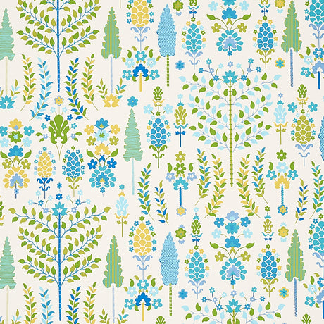 DESNA wallpaper in Peacock by Schumacher, whimsical folk-art inspired forest and floral pattern in blue, green, and yellow tones, shown in a bright bathroom setting.