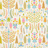 DESNA wallpaper by Schumacher features a whimsical forest of colorful trees and flowers in a folk-art style, perfect for adding charm to any room.