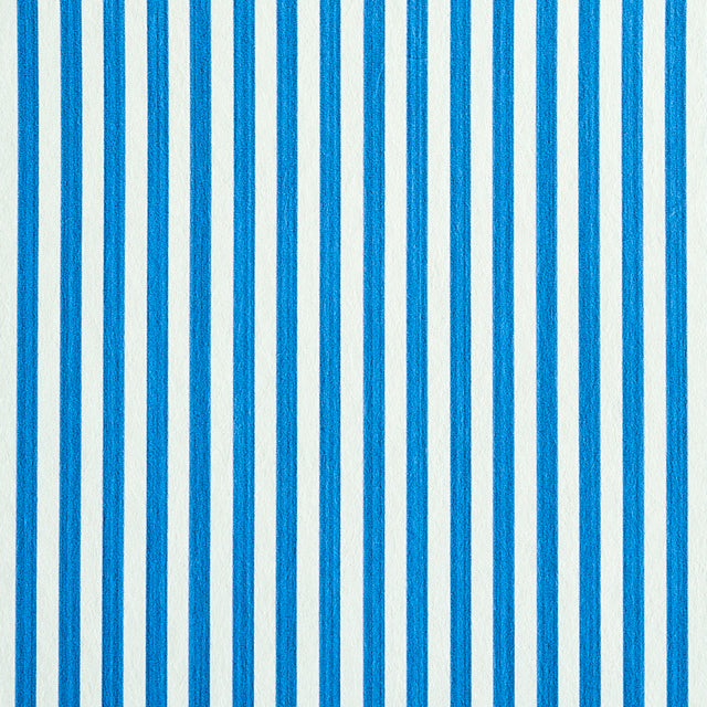 Edwin Stripe Narrow wallpaper in cobalt blue and white, featuring narrow vertical stripes for a classic, dimensional look.