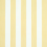 Edwin Stripe Medium wallpaper in Buttercup by Schumacher, classic yellow and white vertical stripes, shown in a styled bedroom and close-up views.