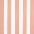 Edwin Stripe Medium wallpaper in pink and white, featuring classic vertical stripes with subtle texture, styled in a modern bedroom setting.