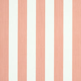 Edwin Stripe Medium wallpaper in pink and white, featuring classic vertical stripes with subtle texture, styled in a modern bedroom setting.
