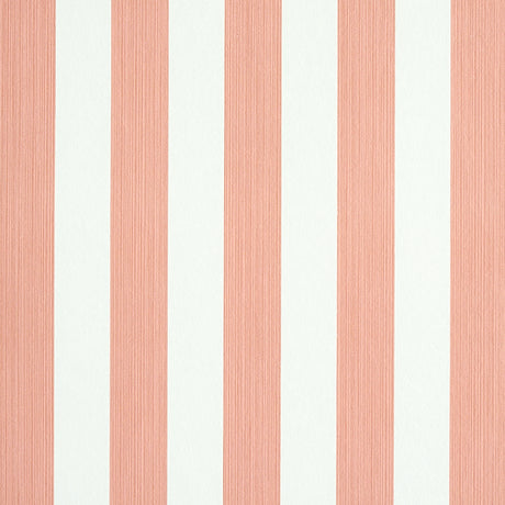 Edwin Stripe Medium wallpaper in pink and white, featuring classic vertical stripes with subtle texture, styled in a modern bedroom setting.