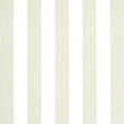 Edwin Stripe Medium wallpaper in Naturelle by Schumacher, a classic vertical stripe wallcovering in a neutral colorway, shown in a bedroom setting.