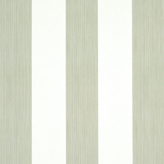 Edwin Stripe Wide wallpaper in Linen by Schumacher, wide vertical stripes in neutral tones, shown in a styled living room setting.