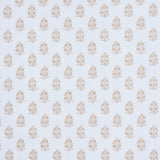 Aditi Sky wallpaper by Schumacher featuring petite bunches of stylized flowers in a hand-blocked print style on a light blue background.