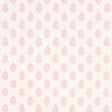 Aditi Blush by Schumacher, a petite stylized floral wallpaper in blush pink on white, shown in detail and installed in a bright, classic interior.
