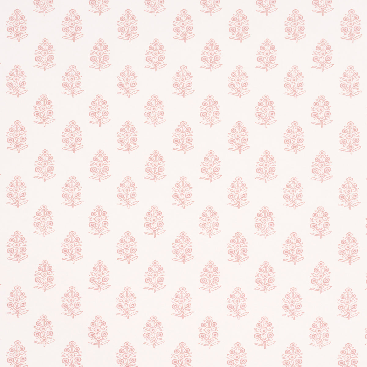 Aditi Blush by Schumacher, a petite stylized floral wallpaper in blush pink on white, shown in detail and installed in a bright, classic interior.