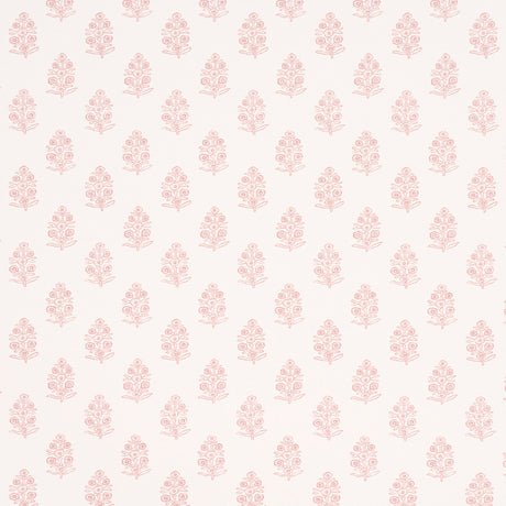 Aditi Blush by Schumacher, a petite stylized floral wallpaper in blush pink on white, shown in detail and installed in a bright, classic interior.