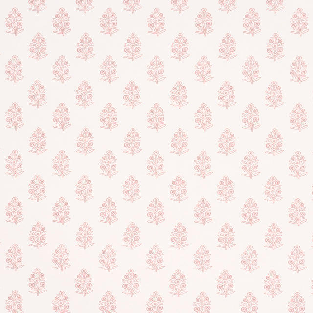 Aditi Blush by Schumacher, a petite stylized floral wallpaper in blush pink on white, shown in detail and installed in a bright, classic interior.