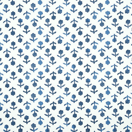 Beatriz Indigo by Schumacher, a diminutive printed floral wallpaper inspired by traditional indigo resist-dye techniques, shown in a bathroom setting.
