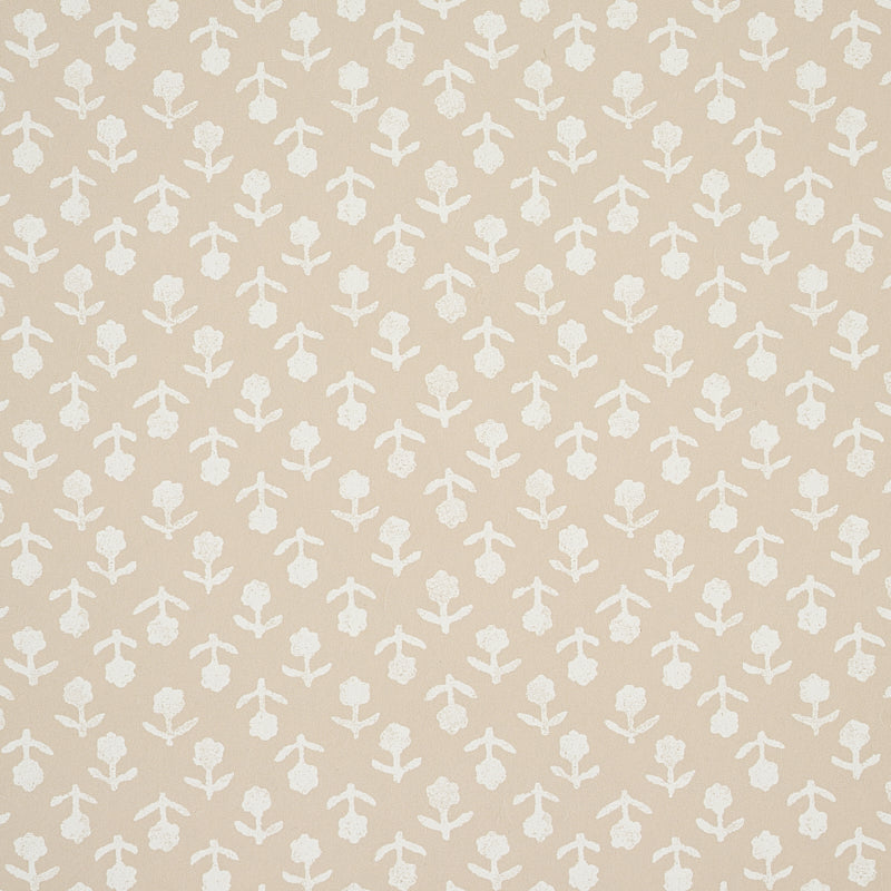 Beatriz wallpaper in Natural by Schumacher, a diminutive printed floral pattern inspired by indigo resist-dye techniques, shown in a bathroom setting.