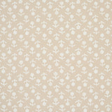 Beatriz wallpaper in Natural by Schumacher, a diminutive printed floral pattern inspired by indigo resist-dye techniques, shown in a bathroom setting.