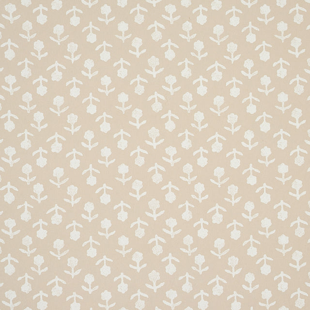 Beatriz wallpaper in Natural by Schumacher, a diminutive printed floral pattern inspired by indigo resist-dye techniques, shown in a bathroom setting.