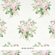 Loudon Rose Blush wallpaper by Schumacher featuring painterly bouquets of pink roses and green leaves on a white background.