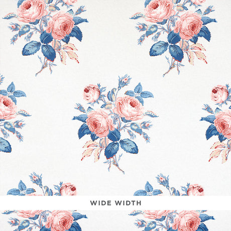 Loudon Rose wallpaper by Schumacher features painterly bouquets of pink roses and blue leaves on a white background.