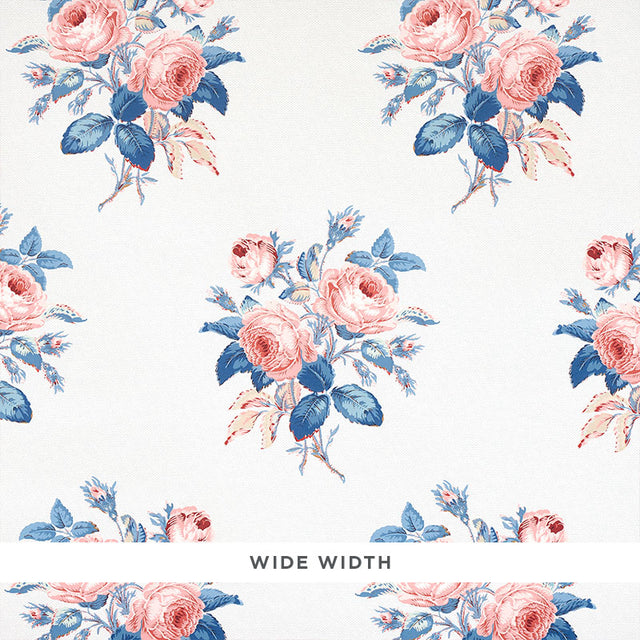 Loudon Rose wallpaper by Schumacher features painterly bouquets of pink roses and blue leaves on a white background.