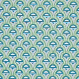 Abelino green and peacock Art Deco geometric wallpaper by Schumacher, shown in a modern bedroom setting