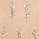 Baracoa terracotta wallpaper with graphic climbing geckos and mottled stucco-like texture by Schumacher