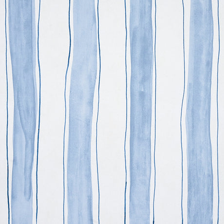 Tracing Stripes wallpaper in Sky by Porter Teleo for Schumacher, featuring hand-painted vertical blue stripes on a white background.