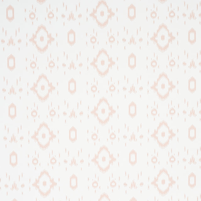 Tabitha Quiet Pink by Schumacher - Soft geometric ikat-inspired wallpaper in pale pink and white, shown in detail and installed in a bathroom.