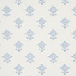 Rubia blue wallpaper with stylized floral motifs and subtle metallic sheen, shown in a bathroom setting.