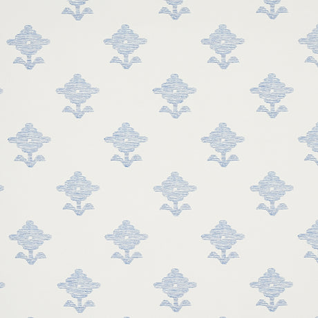 Rubia blue wallpaper with stylized floral motifs and subtle metallic sheen, shown in a bathroom setting.