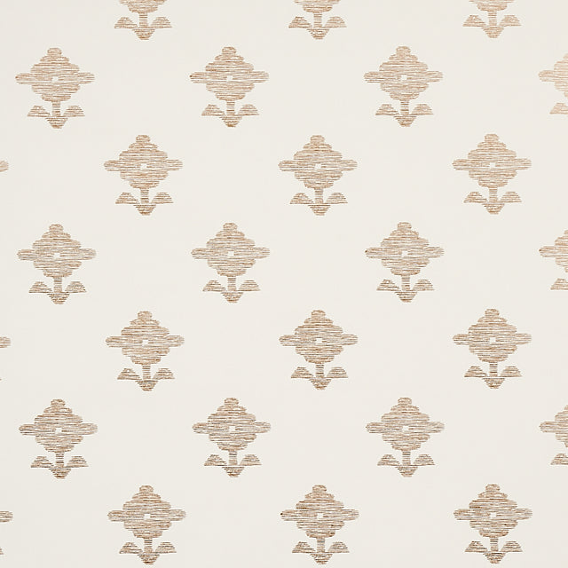 Rubia Ivory wallpaper by Schumacher featuring stylized floral motifs with fine linework and a subtle metallic sheen, shown in a bathroom setting.