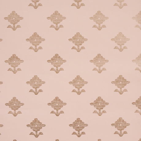 Rubia Blush wallpaper by Schumacher featuring stylized metallic floral motifs on a blush pink background, shown in a bathroom setting.