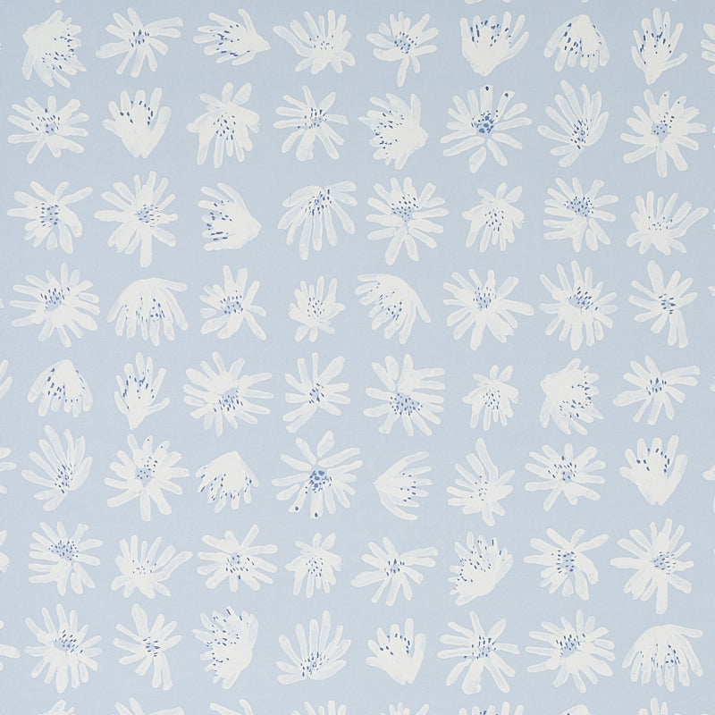 Meadow Rock Sky wallpaper by Caroline Z Hurley for Schumacher, featuring hand-painted white floral motifs on a soft blue background.
