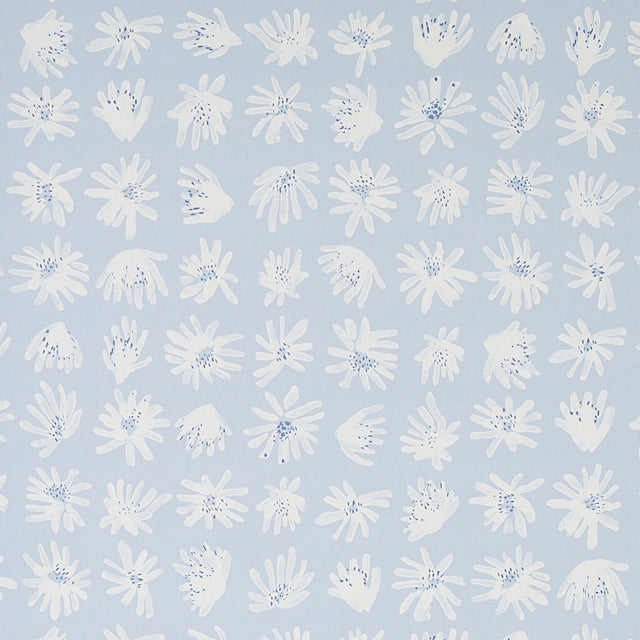 Meadow Rock Sky wallpaper by Caroline Z Hurley for Schumacher, featuring hand-painted white floral motifs on a soft blue background.