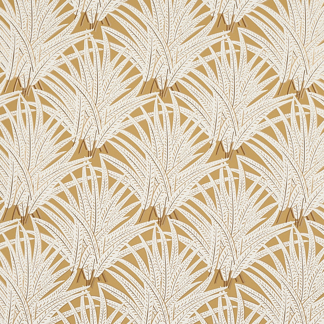 Zenada gold wallpaper from Schumacher's Copacabana collection featuring a botanical palm leaf pattern in white on a gold background.