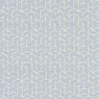 Coleridge Chambray by Schumacher - geometric blue and white wallpaper with a woven fabric texture, shown in a modern living room setting.