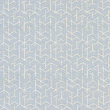 Coleridge Chambray by Schumacher - geometric blue and white wallpaper with a woven fabric texture, shown in a modern living room setting.