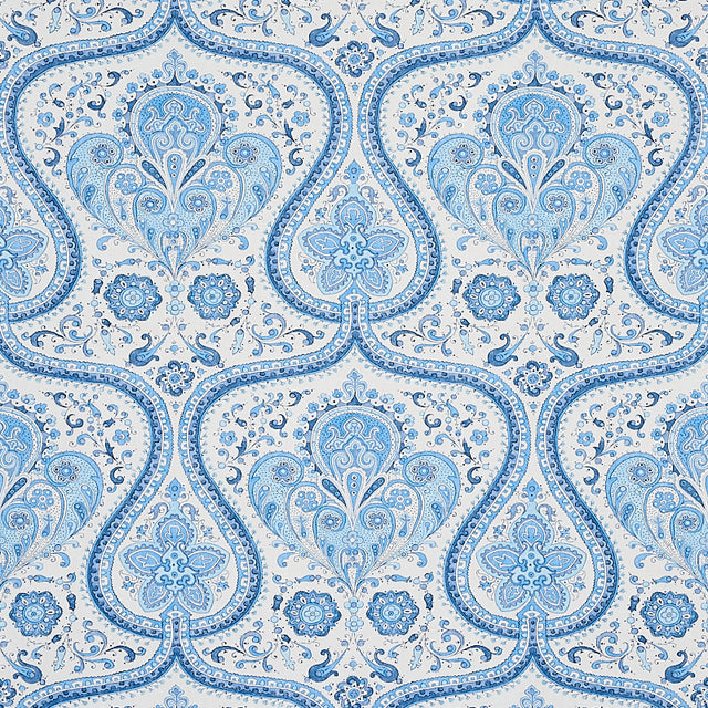 Paisley Court blue wallpaper by Schumacher featuring intricate paisley and floral patterns in a scrolling fretwork design.