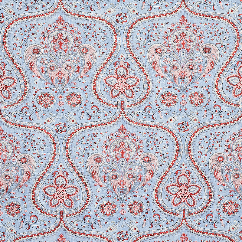 Paisley Court chambray wallpaper with intricate paisley and floral designs in blue and red by Schumacher