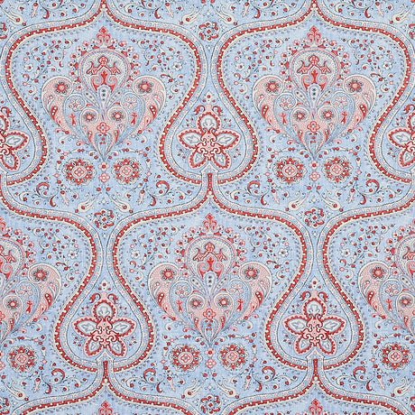Paisley Court chambray wallpaper with intricate paisley and floral designs in blue and red by Schumacher