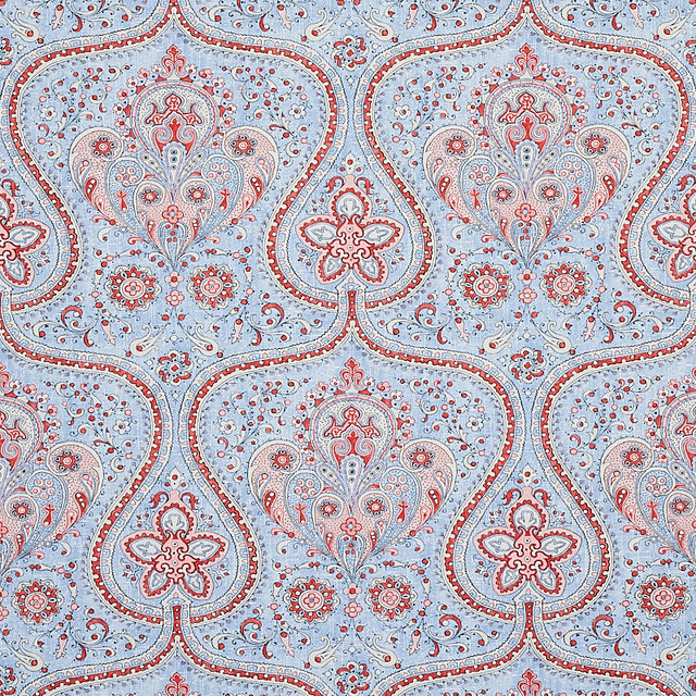 Paisley Court chambray wallpaper with intricate paisley and floral designs in blue and red by Schumacher