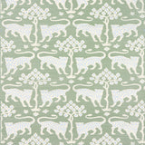 Woodland Leopard Sisal wallpaper in Seaglass by Schumacher, featuring a hand-drawn leopard and tree motif on textured sisal.