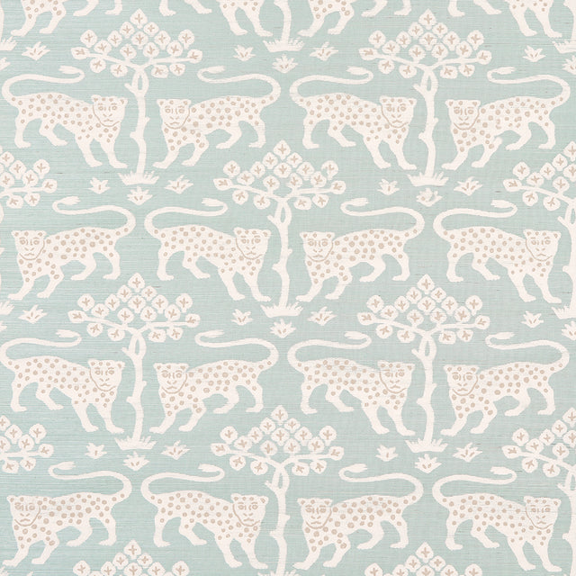 Woodland Leopard Sisal wallpaper in Waterblue by Schumacher, featuring a hand-drawn leopard and tree motif on textured sisal.