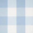 Willa Check Large in Chambray by Schumacher - large-scale blue and white gingham plaid wallpaper in a bedroom setting