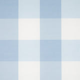 Willa Check Large in Chambray by Schumacher - large-scale blue and white gingham plaid wallpaper in a bedroom setting