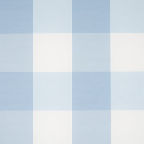 Willa Check Large in Chambray by Schumacher - large-scale blue and white gingham plaid wallpaper in a bedroom setting