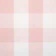 Willa Check Large in pink by Schumacher, a playful oversized gingham plaid wallpaper shown in a styled bedroom and detail views.