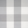 Willa Check Large grey plaid wallpaper by Schumacher, extra-large-scale gingham pattern, shown in a modern bedroom setting.